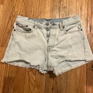 Levi’s distressed high rise light denim shorts